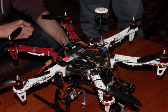 A hexacopter sitting on a bar table.