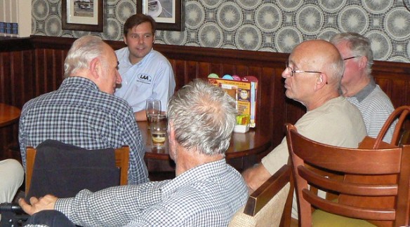 Phill Hall talking to strut members in the Swiss Cottage pub.