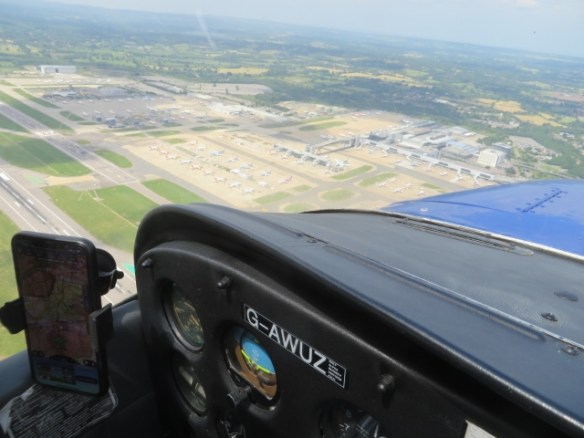 A view of Gatwick Airport from low level from the windscreen of a light aircraft.
