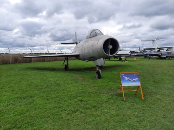 A Dassault Mystere aircraft parked on grass.