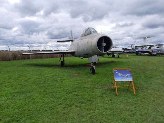 A Dassault Mystere aircraft parked on grass.